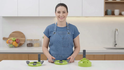 Götze 2-in-1 Food Divider with stainless steel apple slicing blades, cutting base, and interchangeable attachment on a white background.