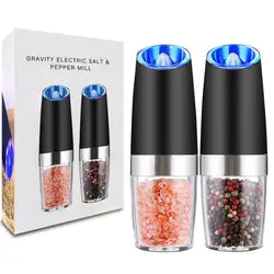 Götze Electric Salt & Pepper Grinder Set with black bodies, clear spice chambers, blue LED lights, and retail packaging.