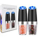 Götze Electric Salt & Pepper Grinder Set with black bodies, clear spice chambers, blue LED lights, and retail packaging.