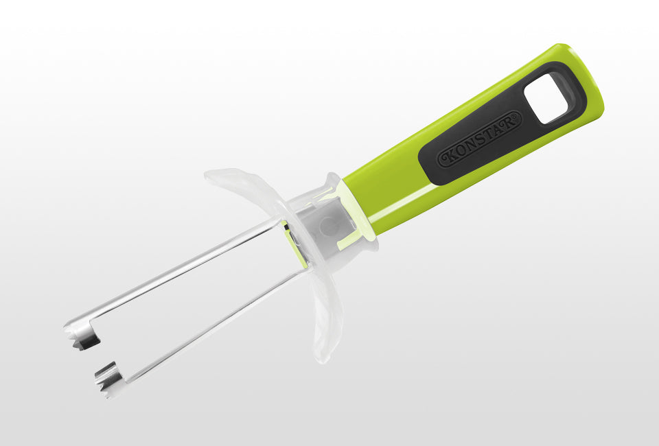 Götze guarded apple corer with green and black ergonomic handle, dual stainless steel coring blades, and clear protective safety guard on a white background.