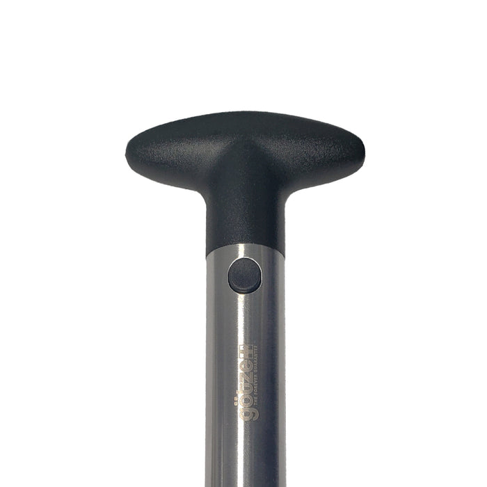 Close-up of the Götze stainless steel pineapple corer and slicer featuring a black ergonomic T-shaped handle and release button.