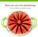 Götze watermelon slicer displaying a whole watermelon divided into 12 evenly sized wedges with a centered core and green handles.